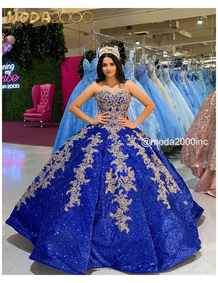Glittery royal blue and gold elegant themed quinceañera dress